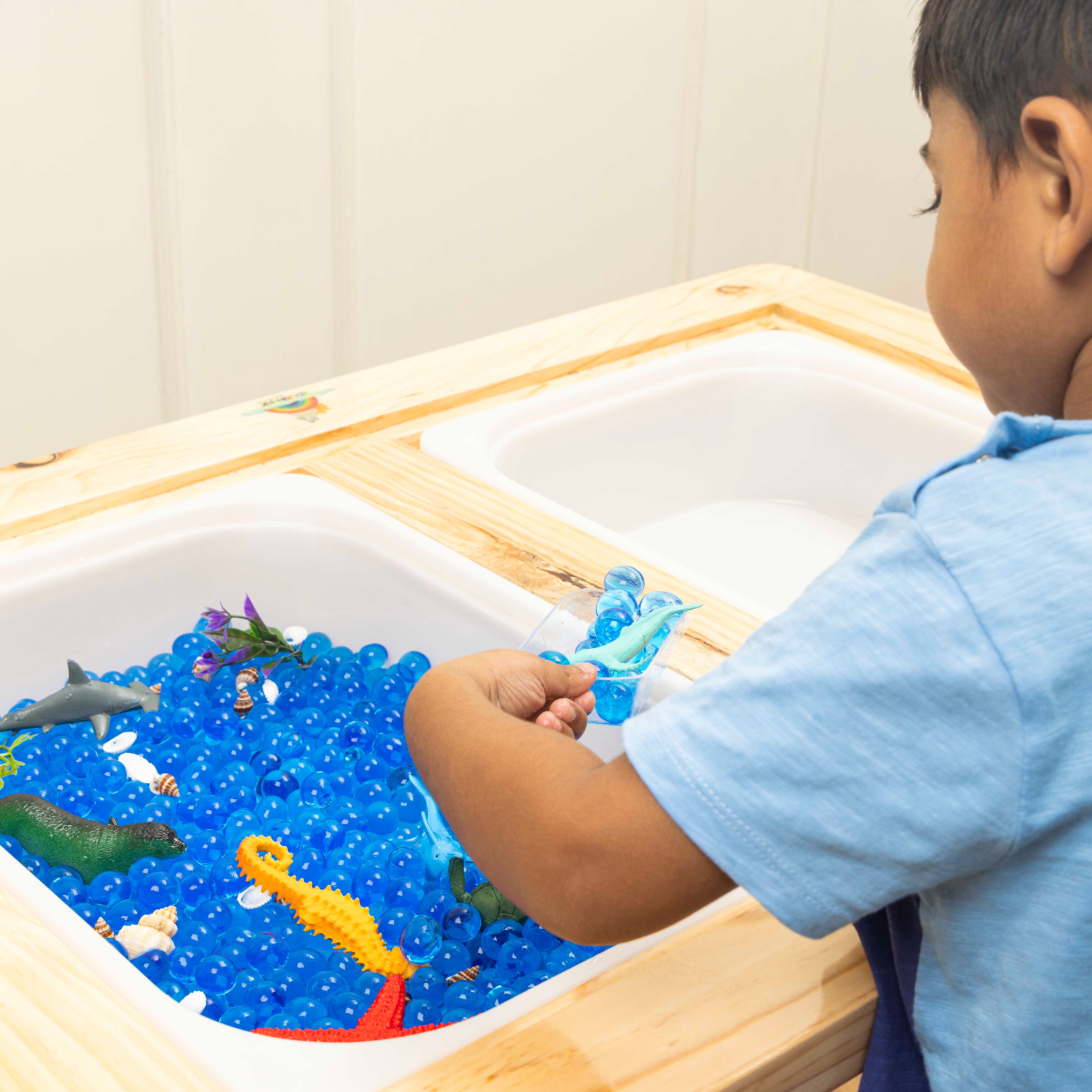 The Children’s Lab Ocean Sensory Bin with sea animals and calming water beads for kids 3–7 years’ water sensory play.
