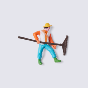 One miniature farmer figure with a rake