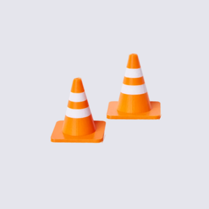 Two miniature orange traffic cones