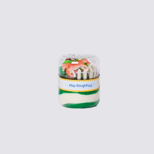 Bottom compartment filled with vibrant, sparkly green play dough.