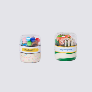 Bottom compartment filled with vibrant, sparkly green play dough. 