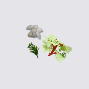 Tree, faux plants and pebbles
